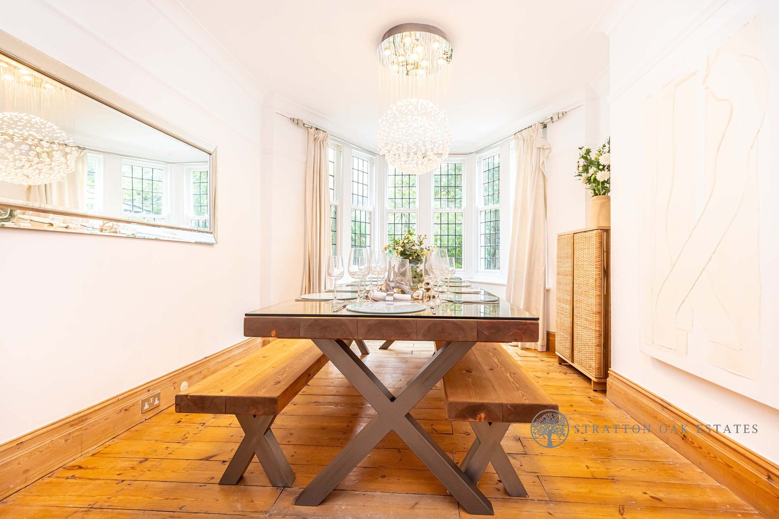 Formal dining room with bay window